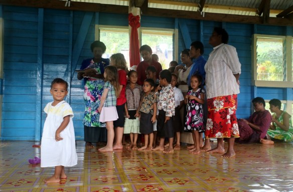 Singing during the church service.