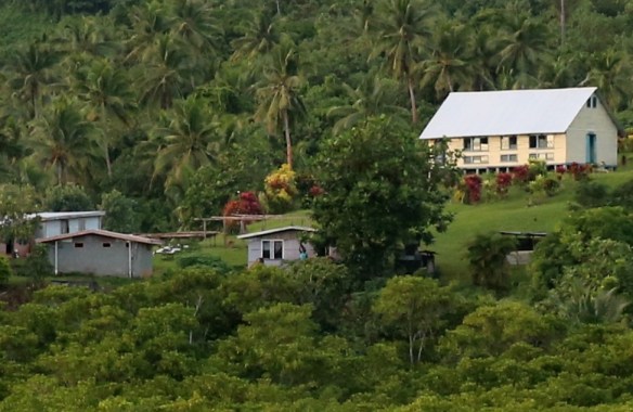 The chief's family waving goodbye.